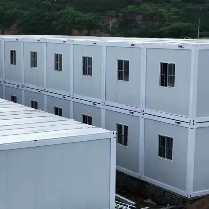 What advantages do the new, reusable, and durable flat-pack container houses offer?